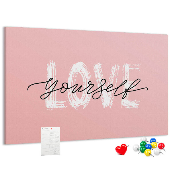 Lavagna di sughero con grafica Amore per se stessi su sfondo rosa