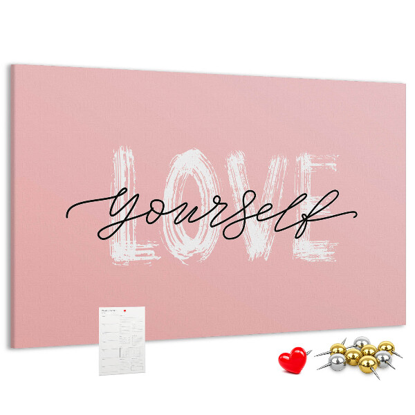 Lavagna di sughero con grafica Amore per se stessi su sfondo rosa