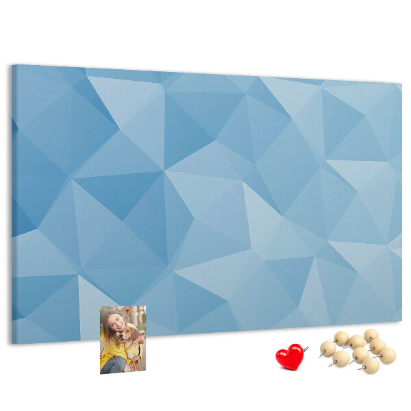 Bacheca in sughero con fantasia geometrica a triangoli blu in diverse tonalità