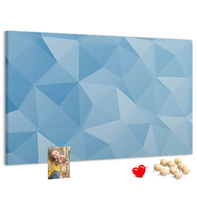 Bacheca in sughero con fantasia geometrica a triangoli blu in diverse tonalità