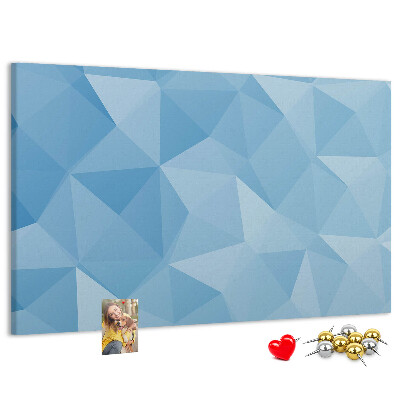 Bacheca in sughero con fantasia geometrica a triangoli blu in diverse tonalità
