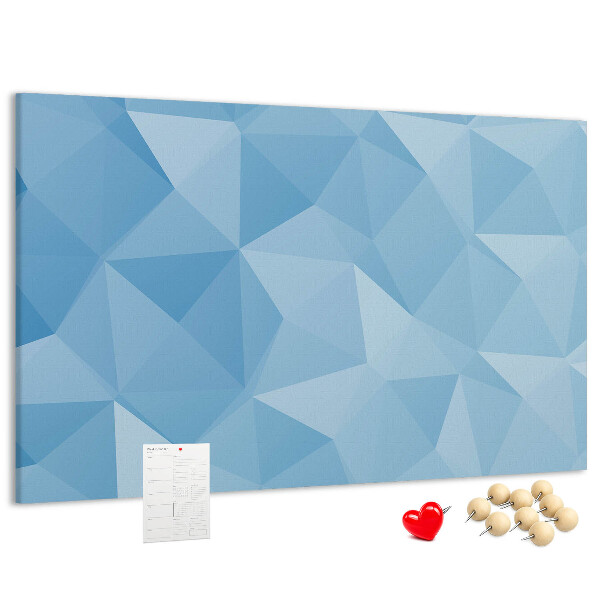 Bacheca in sughero con fantasia geometrica a triangoli blu in diverse tonalità