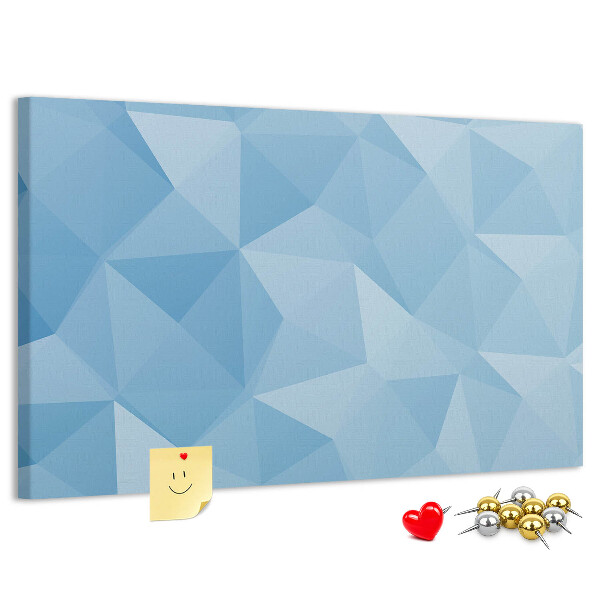 Bacheca in sughero con fantasia geometrica a triangoli blu in diverse tonalità