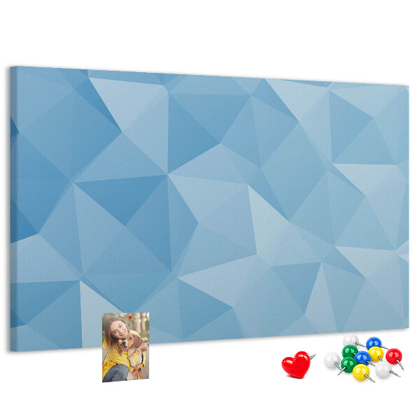Bacheca in sughero con fantasia geometrica a triangoli blu in diverse tonalità