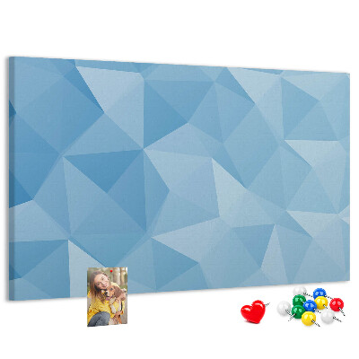 Bacheca in sughero con fantasia geometrica a triangoli blu in diverse tonalità