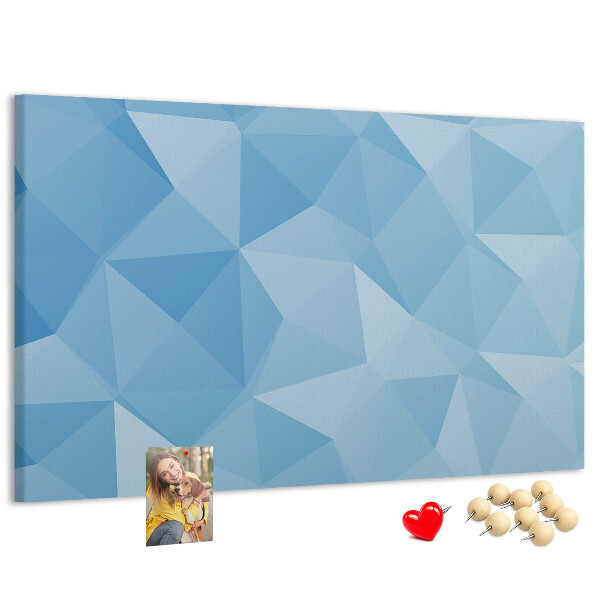 Bacheca in sughero con fantasia geometrica a triangoli blu in diverse tonalità