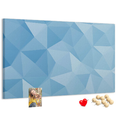 Bacheca in sughero con fantasia geometrica a triangoli blu in diverse tonalità