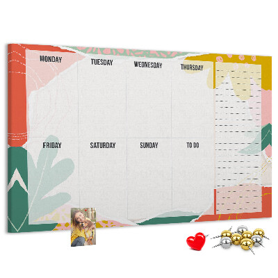 Bacheca in sughero con calendario floreale dai tocchi colorati