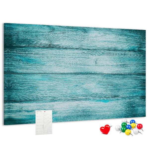 Bacheca in sughero con sfondo in assi di legno verdi e blu
