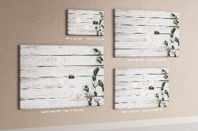 Bacheca in sughero con cornice in legno rustico e rami verdi