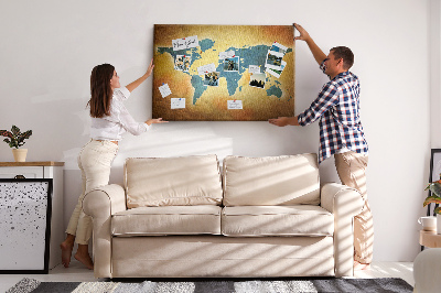 Bacheca in sughero con mappa del mondo su sfondo carta marrone