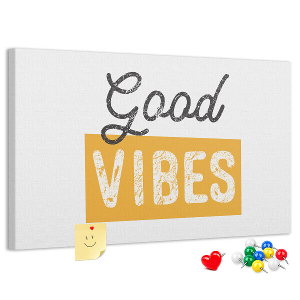 Lavagna di sughero con scritta energica su sfondo chiaro