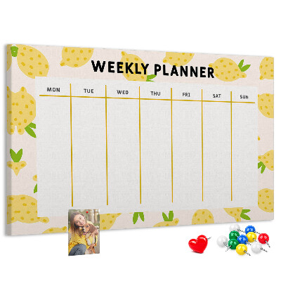 Bacheca in sughero con calendario settimanale e motivo a limoni