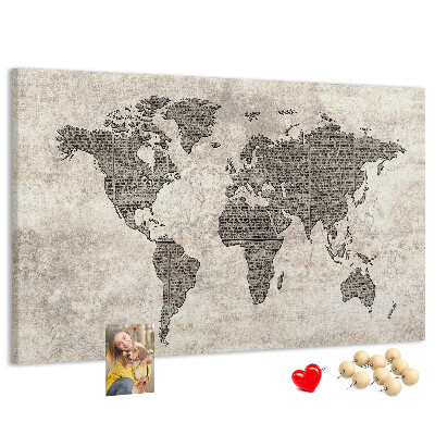 Lavagna di sughero mappa del mondo con texture di giornale