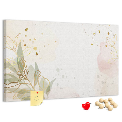 Lavagna di sughero con fiori delicati su sfondo pastello