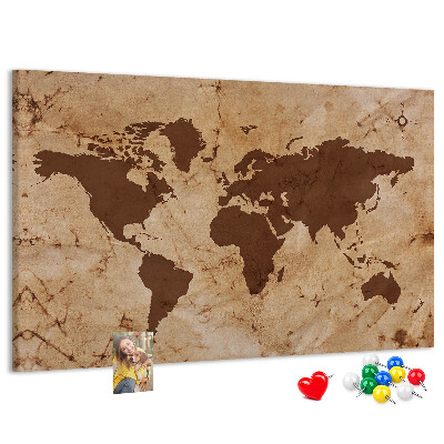 Lavagna di sughero con mappa del mondo antico su sfondo marrone