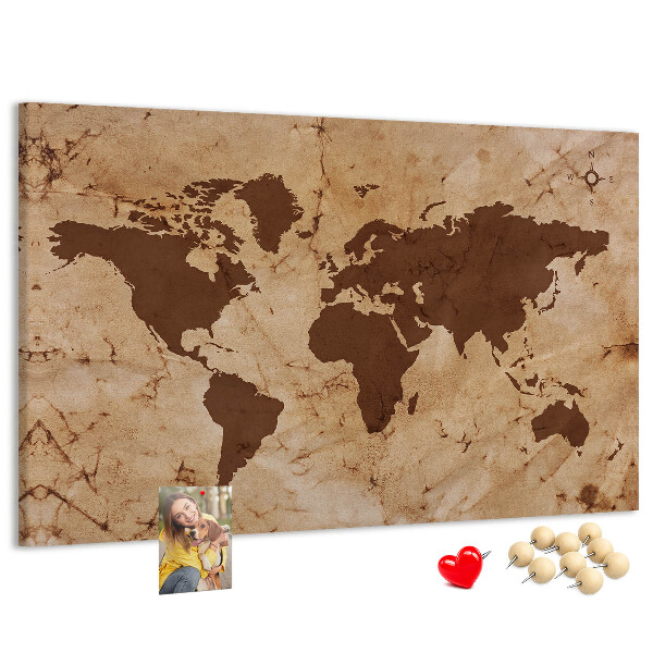 Lavagna di sughero con mappa del mondo antico su sfondo marrone