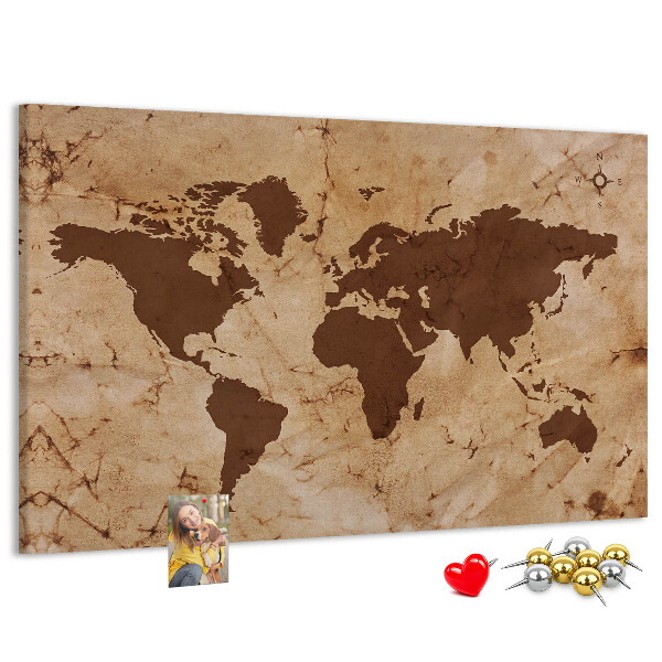 Lavagna di sughero con mappa del mondo antico su sfondo marrone