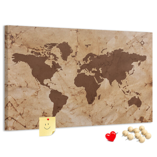 Lavagna di sughero con mappa del mondo antico su sfondo marrone