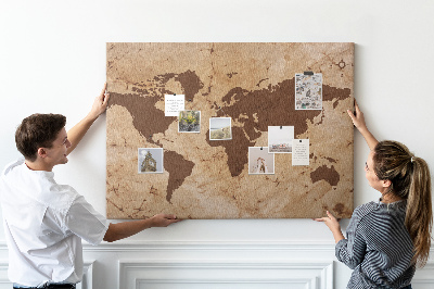 Lavagna di sughero con mappa del mondo antico su sfondo marrone