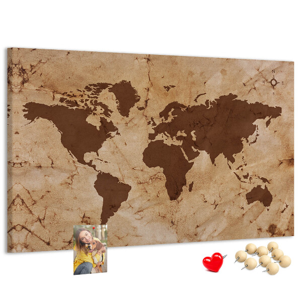 Lavagna di sughero con mappa del mondo antico su sfondo marrone