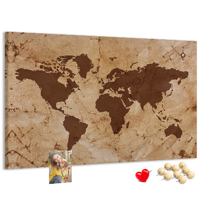 Lavagna di sughero con mappa del mondo antico su sfondo marrone