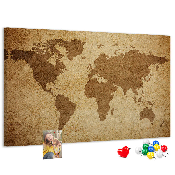 Lavagna di sughero con stampa antica mappa del mondo su sfondo bronzo