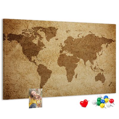 Lavagna di sughero con stampa antica mappa del mondo su sfondo bronzo