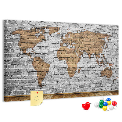 Lavagna di sughero mappa del mondo su muro di mattoni