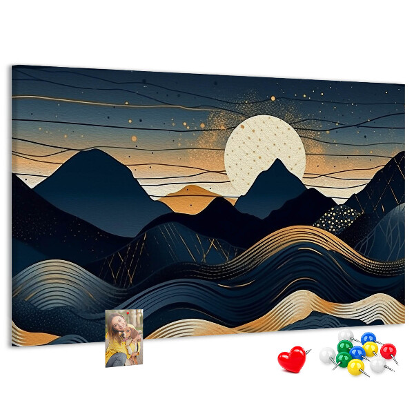 Lavagna di sughero con stampa di un paesaggio montano illuminato di notte