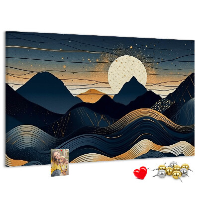 Lavagna di sughero con stampa di un paesaggio montano illuminato di notte