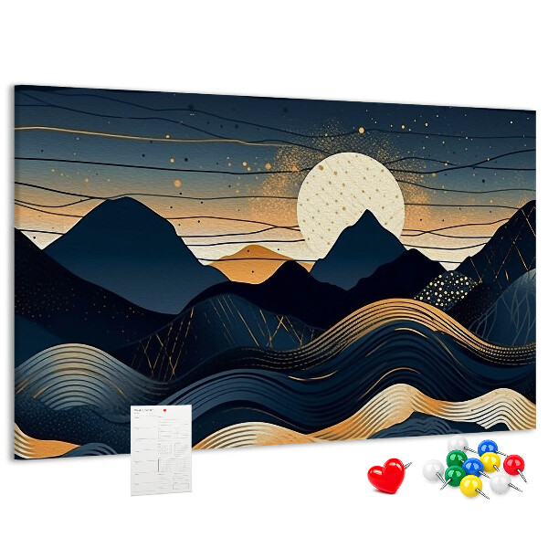 Lavagna di sughero con stampa di un paesaggio montano illuminato di notte