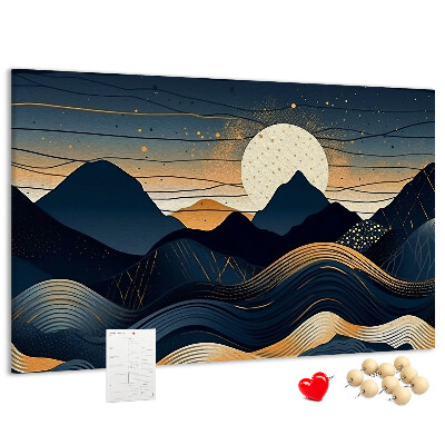 Lavagna di sughero con stampa di un paesaggio montano illuminato di notte