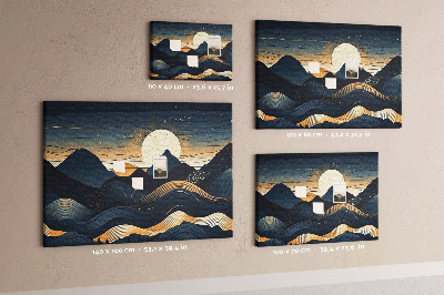 Lavagna di sughero con stampa di un paesaggio montano illuminato di notte