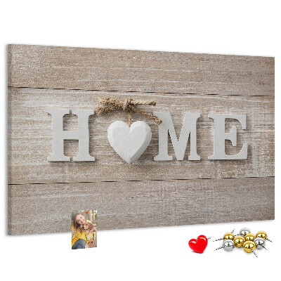 Lavagna di sughero con scritta elegante HOME e decorazione a cuore