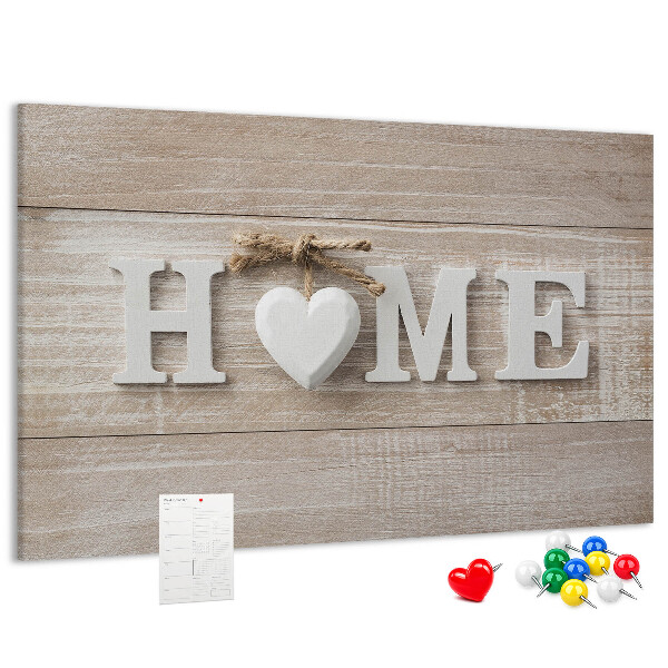 Lavagna di sughero con scritta elegante HOME e decorazione a cuore