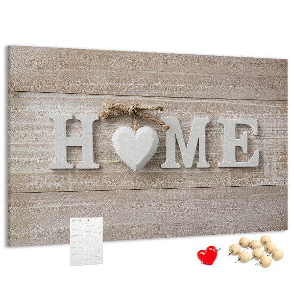 Lavagna di sughero con scritta elegante HOME e decorazione a cuore