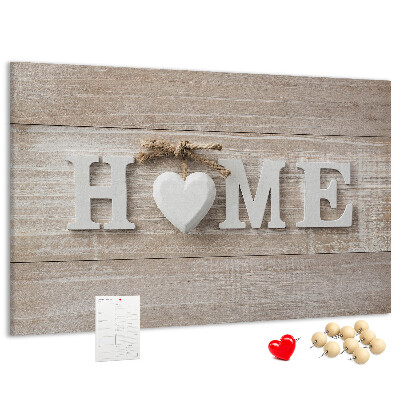 Lavagna di sughero con scritta elegante HOME e decorazione a cuore