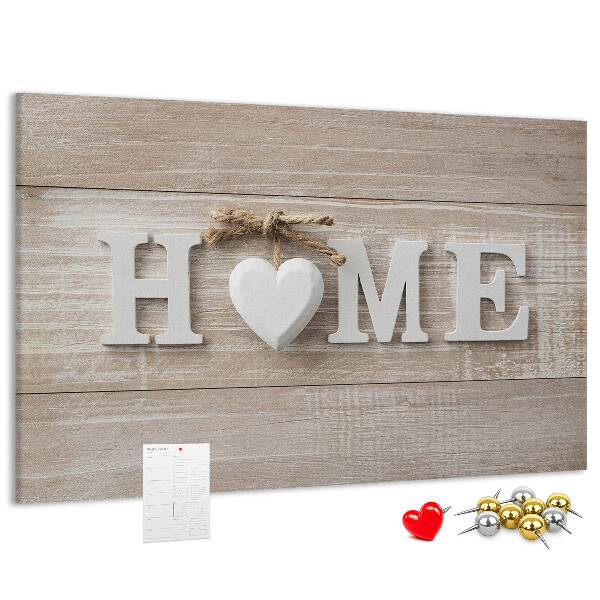 Lavagna di sughero con scritta elegante HOME e decorazione a cuore