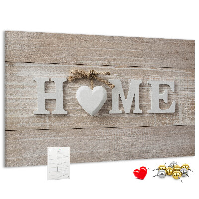 Lavagna di sughero con scritta elegante HOME e decorazione a cuore