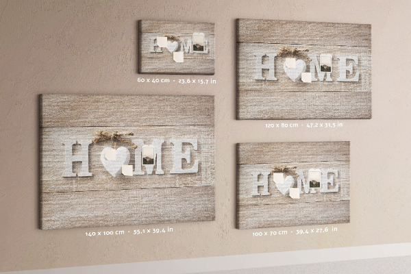 Lavagna di sughero con scritta elegante HOME e decorazione a cuore