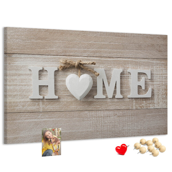 Lavagna di sughero con scritta elegante HOME e decorazione a cuore