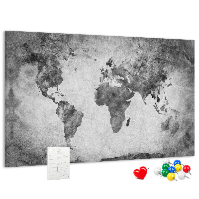 Lavagna di sughero con vecchia mappa del mondo nei toni del grigio