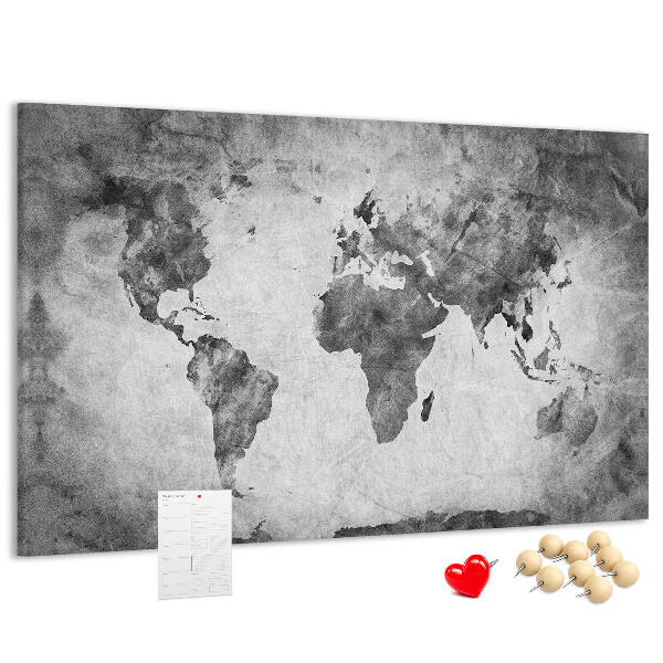 Lavagna di sughero con vecchia mappa del mondo nei toni del grigio