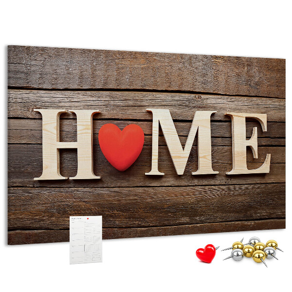 Bacheca in sughero con lettere in legno e cuore sullo sfondo
