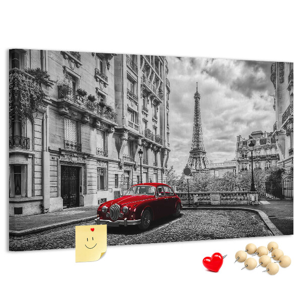 Bacheca in sughero con illustrazione di un'auto rossa a Parigi