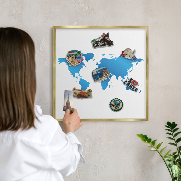 Lavagna per calamite delle vacanze con cornice dorata Mappa del mondo
