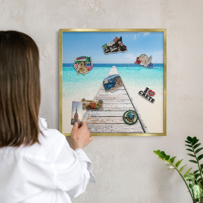 Lavagna magnetica per calamite souvenir in colore oro Molo sull'oceano