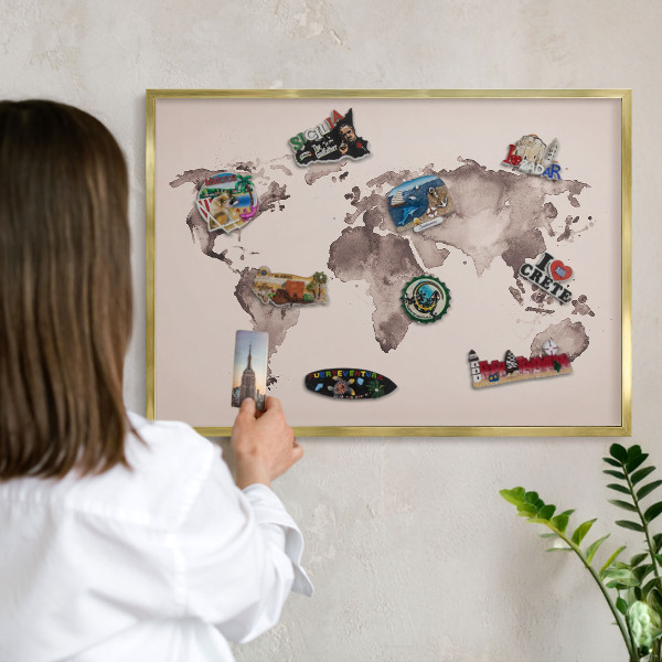 Lavagna per calamite delle vacanze con cornice dorata Mappa del mondo