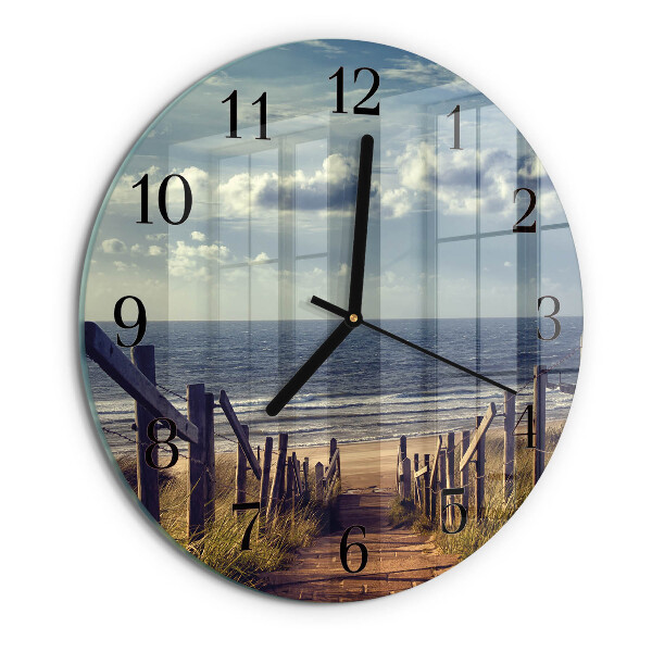 Orologio rotondo spiaggia mare